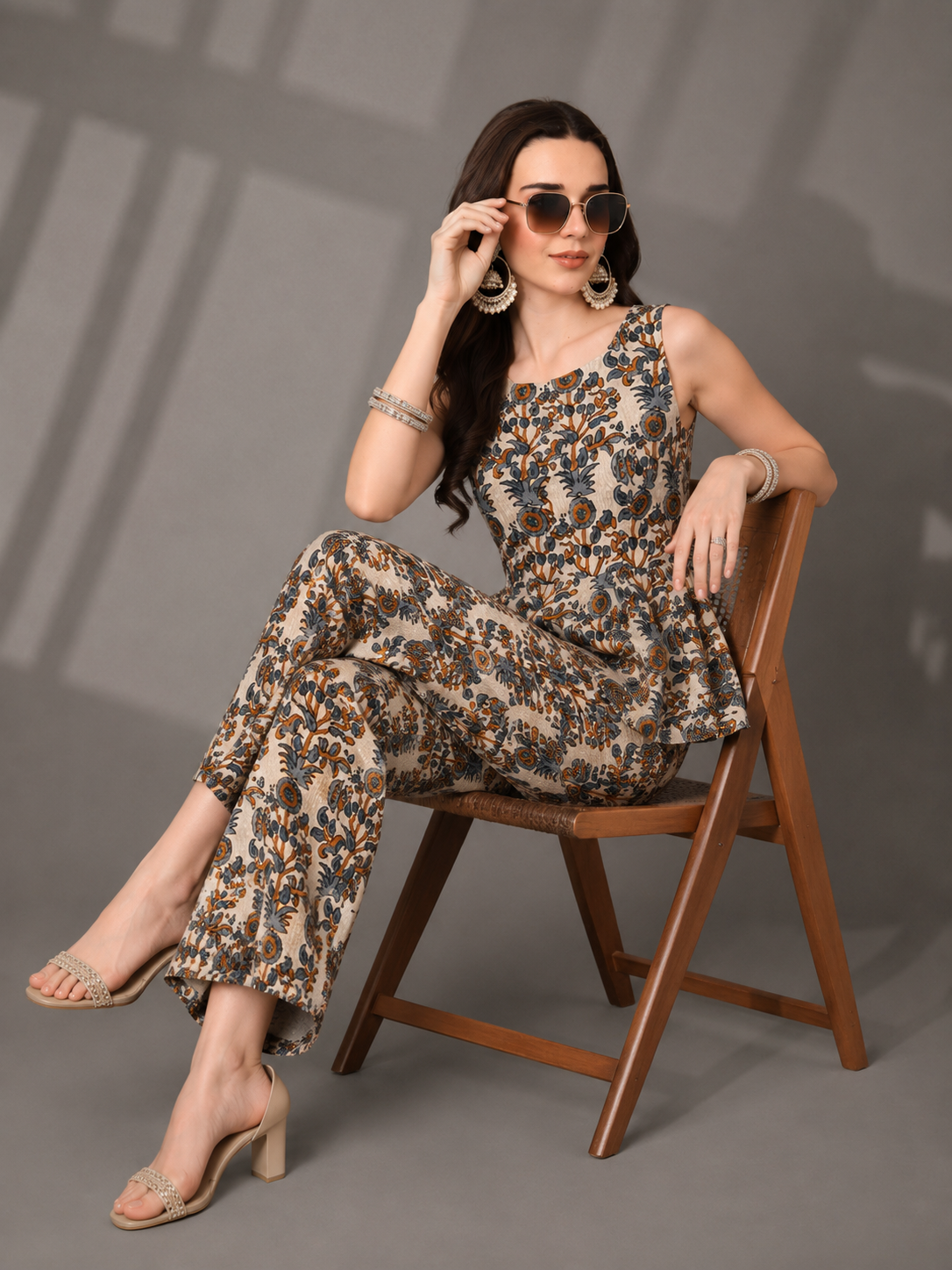 CHIC ELAN Women's Beige Floral Printed Co-Ord Set | Sleeveless Peplum Top & Wide Leg Pants